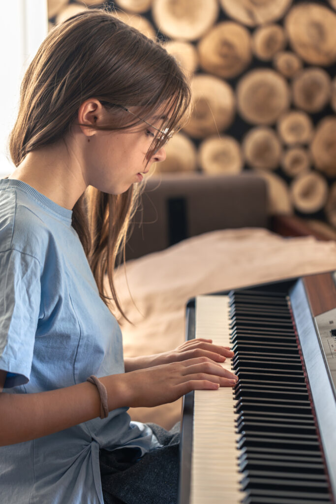 beautiful girl plays piano playing piano musical instruments beautiful girl plays piano playing piano musical instruments